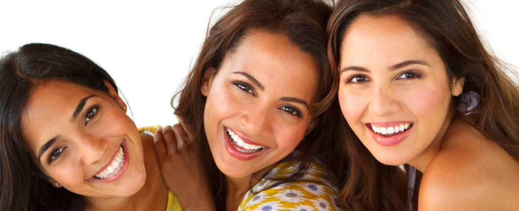 three smiling women